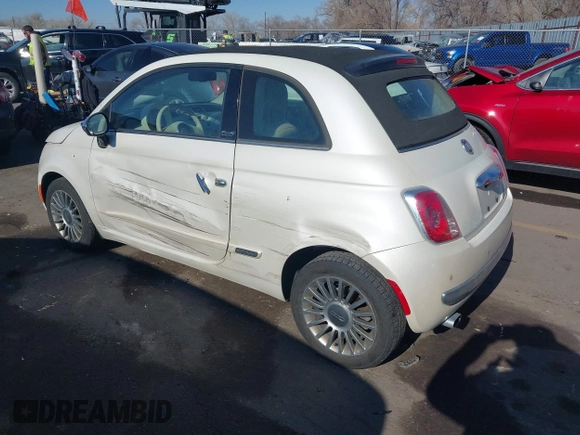 2012 FIAT 500 Lounge z VIN 3C3CFFER7CT119147, wystawiony jako IAAI lot #41431509 z przebiegiem 140 084 mil mil oraz . Historia ofert i sprzedaży dostępna na DreamBid. Obrazek 3.