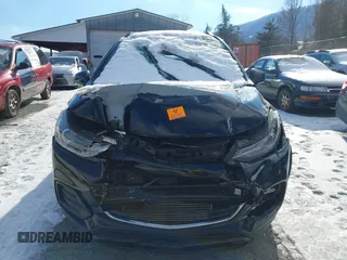 2022 Chevrolet Trax LT with VIN KL7CJPSM2NB567855, listed as a IAAI auction lot 41242877 with 87,001 mi miles. Bid and sale history available at carsss.com. Image 12.
