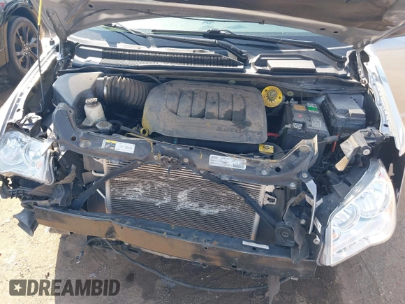 2020 Dodge Grand Caravan SE with VIN 2C4RDGBG1LR237363, listed as a IAAI auction lot 40096749 with 120,742 mi miles and . Bid and sale history available at DreamBid. Image 10.