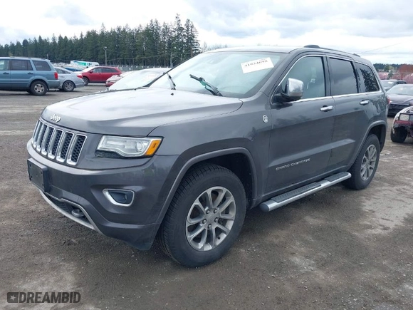 2014 Jeep Grand Cherokee Overland with VIN 1C4RJFCM7EC427204, listed as a IAAI auction lot 41934698 with 147,131 mi miles. Bid and sale history available at carsss.com. Image 2.