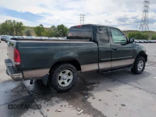 2003 Ford F-150 XL with VIN 2FTRX172X3CA58789, listed as a Copart auction lot 57986695 with 160,124 mi miles and Salvage title. Bid and sale history available at DreamBid. Image 3.