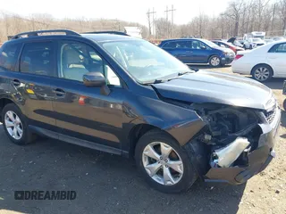 2014 Subaru Forester Premium z VIN JF2SJAECXEH524636, wystawiony jako IAAI lot #41720660 z przebiegiem 174 909 mil mil oraz . Historia ofert i sprzedaży dostępna na DreamBid. Obrazek 17.