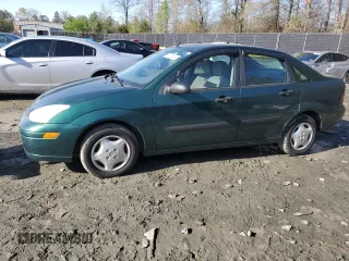 2001 Ford Focus LX with VIN 1FAFP33P91W363918, listed as a Copart auction lot 52200585 with 162,988 mi miles and Salvage Title. Bid and sale history available at carsss.com. Image 1.