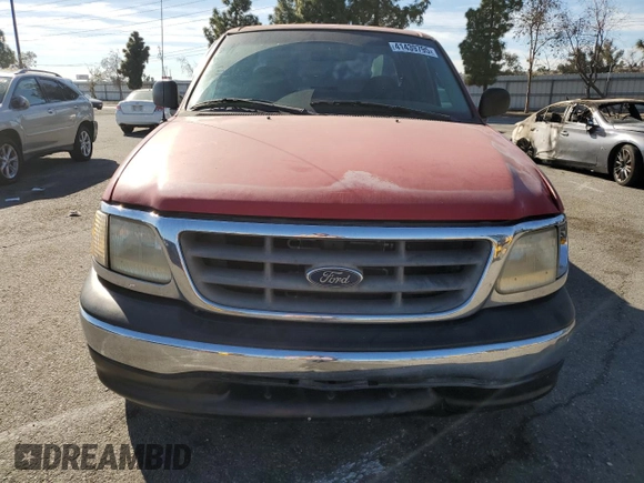 2000 Ford F-150 XL with VIN 1FTZX1721YNA67771, listed as a Copart auction lot 41439795 with 0 mi miles and Salvage Title. Bid and sale history available at carsss.com. Image 5.