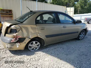 2009 Kia Rio LX with VIN KNADE223996521831, listed as a Copart auction lot 69126284 with 183,796 mi miles and Salvage Title. Bid and sale history available at DreamBid. Image 3.