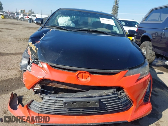 2015 Scion tC with VIN JTKJF5C71FJ006863, listed as a IAAI auction lot 41332681 with 91,559 mi miles. Bid and sale history available at carsss.com. Image 13.
