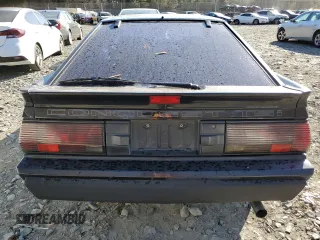 1987 Chrysler Conquest z VIN JJ3CC54N1HZ023316, wystawiony jako Copart lot #83362964 z przebiegiem 196 755 mil mil oraz Szkody całkowita. Historia ofert i sprzedaży dostępna na DreamBid. Obrazek 6.