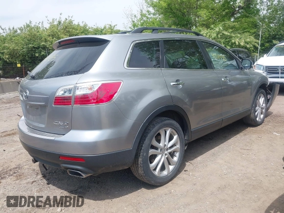 2011 Mazda CX-9 Grand Touring with VIN JM3TB3DV2B0332191, listed as a IAAI auction lot 42211435 with 155,801 mi miles and . Bid and sale history available at DreamBid. Image 4.