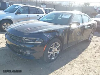 2016 Dodge Charger SXT with VIN 2C3CDXJG5GH105388, listed as a IAAI auction lot 41865086 with 57,535 mi miles. Bid and sale history available at carsss.com. Image 2.