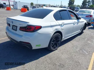 2023 BMW 5 Series 530e with VIN WBA13AG09PCM41820, listed as a IAAI auction lot 42409541 with 17,715 mi miles and . Bid and sale history available at DreamBid. Image 4.