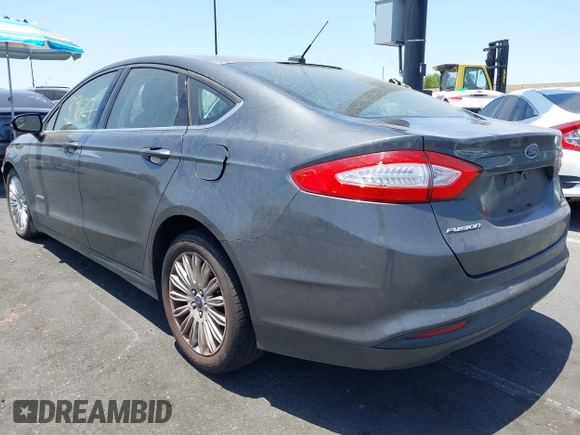 2015 Ford Fusion SE Hybrid with VIN 3FA6P0LU4FR305908, listed as a IAAI auction lot 42539627 with 91,467 mi miles and . Bid and sale history available at DreamBid. Image 3.