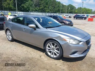 2014 Mazda 6 i Touring with VIN JM1GJ1V67E1126758, listed as a IAAI auction lot 42424808 with 126,293 mi miles and . Bid and sale history available at DreamBid. Image 1.