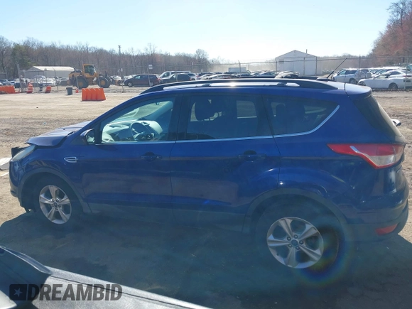 2013 Ford Escape SE with VIN 1FMCU9GX5DUB20394, listed as a IAAI auction lot 41889989 with 121,417 mi miles. Bid and sale history available at carsss.com. Image 13.