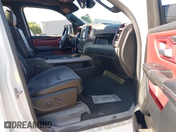 2019 Ram 1500 Rebel z VIN 1C6SRFLT5KN923837, wystawiony jako IAAI lot #41961921 z przebiegiem 68 400 mil mil oraz . Historia ofert i sprzedaży dostępna na DreamBid. Obrazek 5.