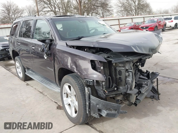 2015 Chevrolet Tahoe LT with VIN 1GNSCBKC5FR504459, listed as a IAAI auction lot 41689405 with 141,783 mi miles and . Bid and sale history available at DreamBid. Image 1.