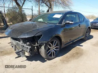 2016 Scion tC z VIN JTKJF5C7XGJ017894, wystawiony jako IAAI lot #41614948 z przebiegiem 109 311 mil mil oraz . Historia ofert i sprzedaży dostępna na DreamBid. Obrazek 18.