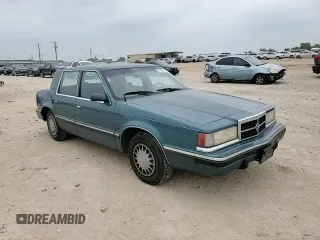 1993 Dodge Dynasty LE z VIN 1B3XC56R3PD124521, wystawiony jako Copart lot #51825725 z przebiegiem 94 336 mil mil oraz Szkoda całkowita • Salvage title. Historia ofert i sprzedaży dostępna na DreamBid. Obrazek 11.