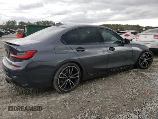 2021 BMW 3 Series 330i with VIN 3MW5R1J0XM8B57091, listed as a Copart auction lot 47584795 with 51,205 mi miles and Salvage Title. Bid and sale history available at carsss.com. Image 3.