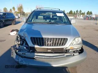 1999 Lexus RX 300 Luxury SUV with VIN JT6HF10U9X0046499, listed as a IAAI auction lot 41375447 with 149,629 mi miles. Bid and sale history available at carsss.com. Image 12.