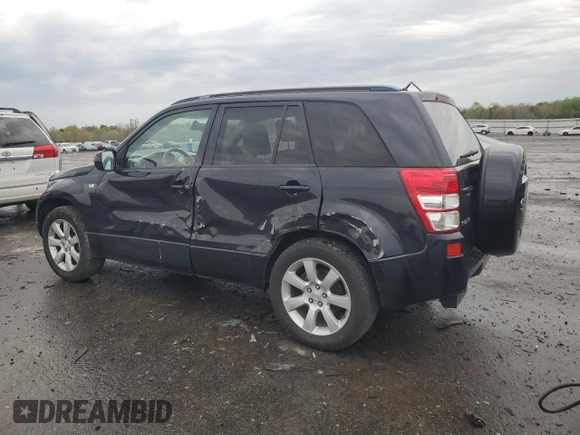 2009 Suzuki Grand Vitara z VIN JS3TE149794100133, wystawiony jako Copart lot #52919795 z przebiegiem 207 928 mil mil oraz Szkoda całkowita • Salvage title. Historia ofert i sprzedaży dostępna na DreamBid. Obrazek 2.
