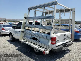 2011 Ford Ranger XL with VIN 1FTKR1EEXBPA10991, listed as a Copart auction lot 58537064 with 102,897 mi miles and Salvage Title. Bid and sale history available at carsss.com. Image 2.