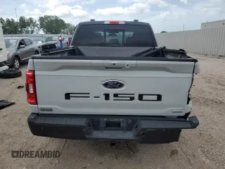 2023 Ford F-150 XL with VIN 1FTFW1E84PKE35275, listed as a Copart auction lot 61867535 with 22,142 mi miles and Salvage title. Bid and sale history available at DreamBid. Image 6.