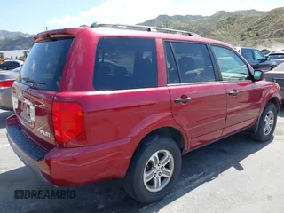 2005 Honda Pilot EX with VIN 2HKYF18495H526930, listed as a IAAI auction lot 41902628 with 128,055 mi miles. Bid and sale history available at carsss.com. Image 4.