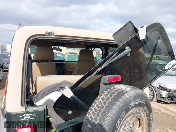 1997 Jeep Wrangler SE with VIN 1J4FY29PXVP406939, listed as a IAAI auction lot 41612380 with 248,314 mi miles. Bid and sale history available at carsss.com. Image 20.