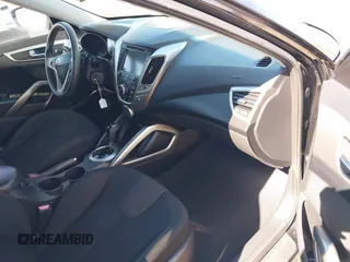 2012 Hyundai Veloster w/Black Int с VIN KMHTC6AD8CU046029, выставлен на аукционе IAAI как лот 41664151 с пробегом 163 523 миль миль и . История ставок и продаж доступна на DreamBid. Изображение 5.