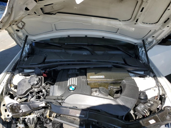 2012 BMW 3 Series 335is with VIN WBAKG1C50CJ217108, listed as a Copart auction lot 56609175 with 105,899 mi miles and Salvage title. Bid and sale history available at DreamBid. Image 11.