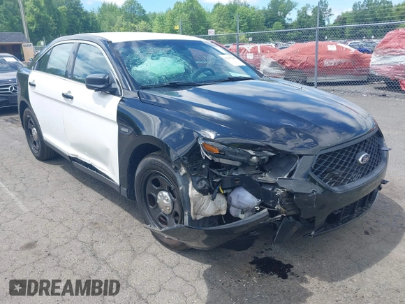 2014 Ford Police Interceptor with VIN 1FAHP2MKXEG185863, listed as a IAAI auction lot 42297860 with 115,188 mi miles and . Bid and sale history available at DreamBid. Image 1.