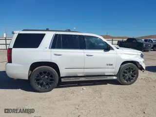 2018 Chevrolet Tahoe LT with VIN 1GNSCBKC8JR128476, listed as a IAAI auction lot 41447799 with 105,209 mi miles. Bid and sale history available at carsss.com. Image 13.