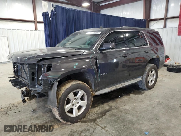 2015 Chevrolet Tahoe LT with VIN 1GNSCBKC3FR112306, listed as a Copart auction lot 51282355 with 136,492 mi miles and Salvage Title. Bid and sale history available at DreamBid. Image 1.