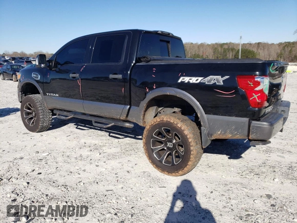 2017 Nissan Titan SV with VIN 1N6AA1E56HN541674, listed as a Copart auction lot 49463325 with 114,520 mi miles and Salvage Title. Bid and sale history available at DreamBid. Image 2.