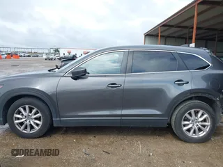 2016 Mazda CX-9 Sport with VIN JM3TCABY5G0122478, listed as a IAAI auction lot 42115795 with 134,980 mi miles and . Bid and sale history available at DreamBid. Image 14.