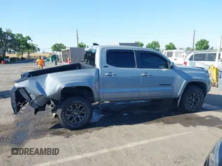 2021 Toyota Tacoma SR5 with VIN 5TFAZ5CN7MX101810, listed as a IAAI auction lot 42454418 with 58,930 mi miles and . Bid and sale history available at DreamBid. Image 14.