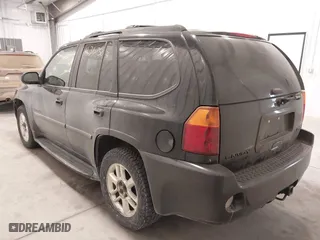 2006 GMC Envoy Denali with VIN 1GKET63M662310282, listed as a IAAI auction lot 41367523 with 216,451 mi miles. Bid and sale history available at carsss.com. Image 3.