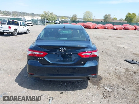 2019 Toyota Camry LE with VIN 4T1B11HK6KU276644, listed as a IAAI auction lot 42037249 with 23,677 mi miles and . Bid and sale history available at DreamBid. Image 16.