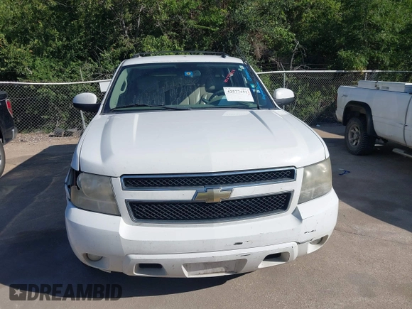 2011 Chevrolet Suburban LT with VIN 1GNSCJE06BR309881, listed as a IAAI auction lot 42577452 with 254,073 mi miles and . Bid and sale history available at DreamBid. Image 12.