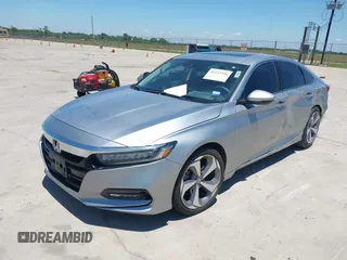 2019 Honda Accord Touring z VIN 1HGCV2F99KA002506, wystawiony jako IAAI lot #42233936 z przebiegiem 88 612 mil mil oraz . Historia ofert i sprzedaży dostępna na DreamBid. Obrazek 17.