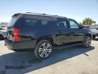 2014 Chevrolet Suburban LS with VIN 1GNSCHE03ER132039, listed as a Copart auction lot 68390234 with 129,744 mi miles and Salvage Title. Bid and sale history available at carsss.com. Image 3.