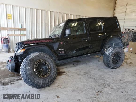 2020 Jeep Wrangler Unlimited Recon with VIN 1C4HJXFN0LW263201, listed as a Copart auction lot 79129424 with 73,405 mi miles and Salvage title. Bid and sale history available at DreamBid. Image 1.