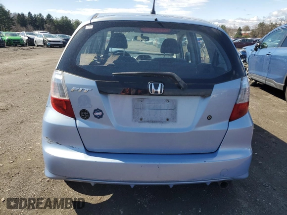 2009 Honda Fit with VIN JHMGE88259S066824, listed as a Copart auction lot 50311215 with 69,135 mi miles and Clean Title. Bid and sale history available at carsss.com. Image 6.