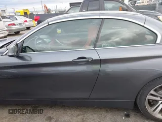 2015 BMW 4 Series 428i with VIN WBA3V7C54FP772531, listed as a IAAI auction lot 41487899 with 90,893 mi miles. Bid and sale history available at carsss.com. Image 15.