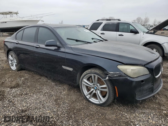 2011 BMW 7 Series 750i with VIN WBAKA8C58BCY36911, listed as a Copart auction lot 45759995 with 143,647 mi miles and Clean title. Bid and sale history available at DreamBid. Image 4.