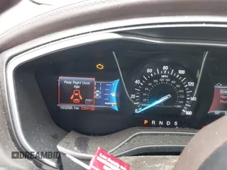 2017 Ford Fusion Titanium with VIN 3FA6P0K96HR105127, listed as a IAAI auction lot 39351701 with 103,295 mi miles. Bid and sale history available at carsss.com. Image 7.