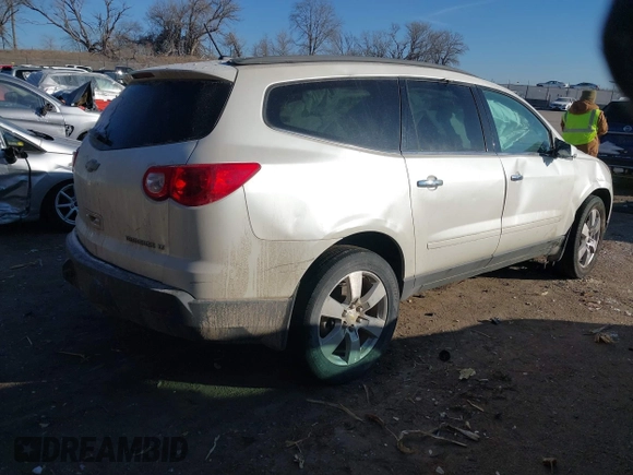 2012 Chevrolet Traverse 1LT with VIN 1GNKRGED4CJ323797, listed as a IAAI auction lot 41267339 with 142,463 mi miles and . Bid and sale history available at DreamBid. Image 4.