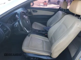 2011 BMW 1 Series 128i with VIN WBAUL7C53BVM79803, listed as a Copart auction lot 89258015 with 132,266 mi miles and Salvage title. Bid and sale history available at DreamBid. Image 7.