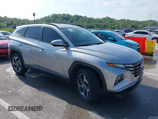 2022 Hyundai Tucson SEL z VIN 5NMJFCAE3NH007613, wystawiony jako IAAI lot #42119662 z przebiegiem 66 520 mil mil oraz . Historia ofert i sprzedaży dostępna na DreamBid. Obrazek 1.