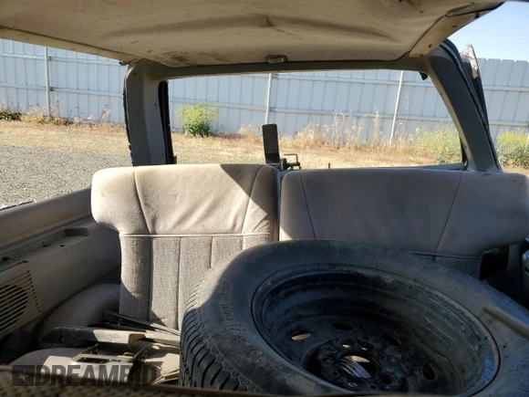 1989 Ford Bronco with VIN 1FMCU14T0KUA33910, listed as a Copart auction lot 57730195 with 53,335 mi miles and Salvage title. Bid and sale history available at DreamBid. Image 10.